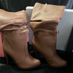 Brand new never worn chestnut high knee boots. Knee high boots.